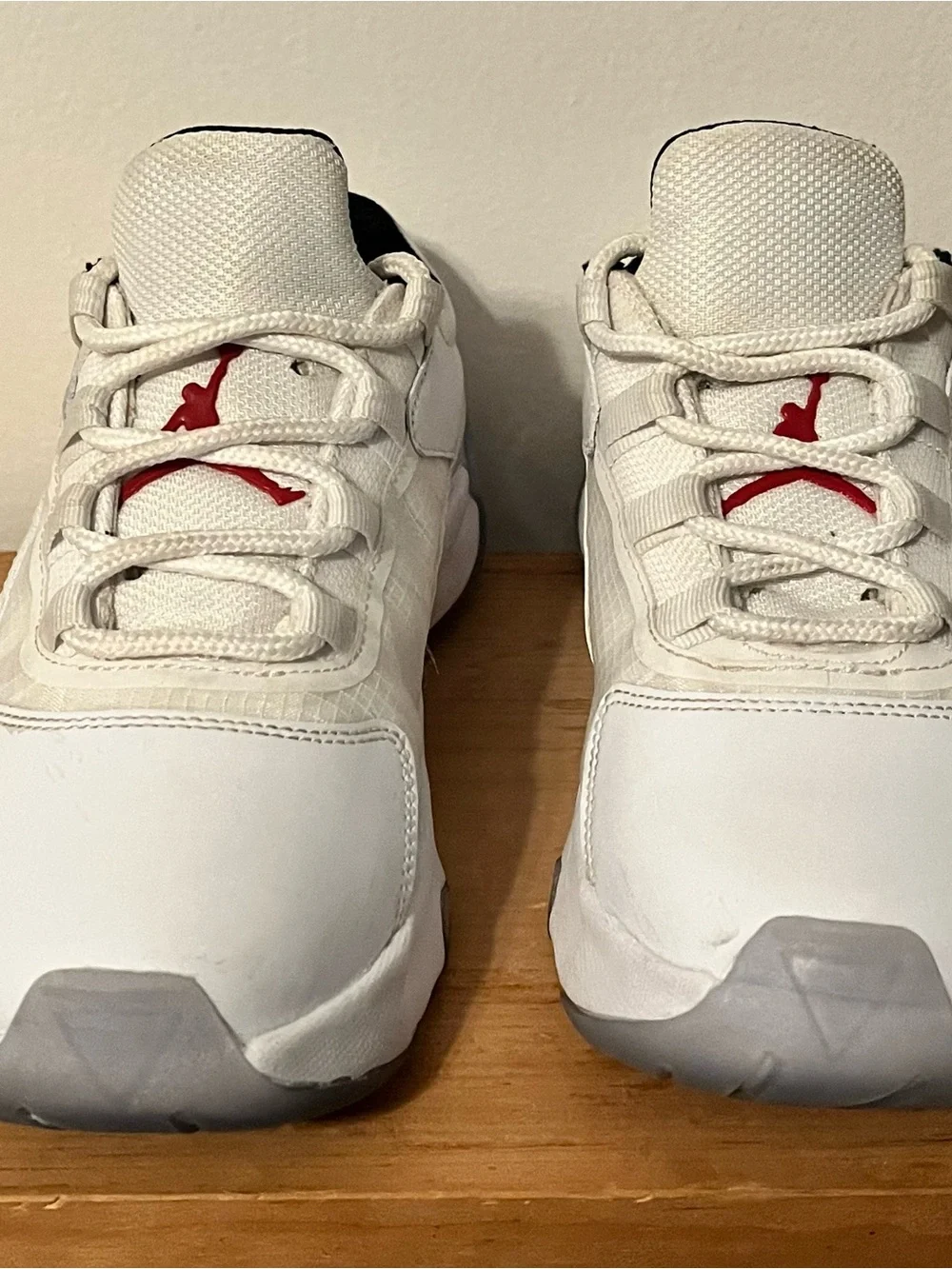 Jordan Kids White Sneakers with Red Jumpman Accent